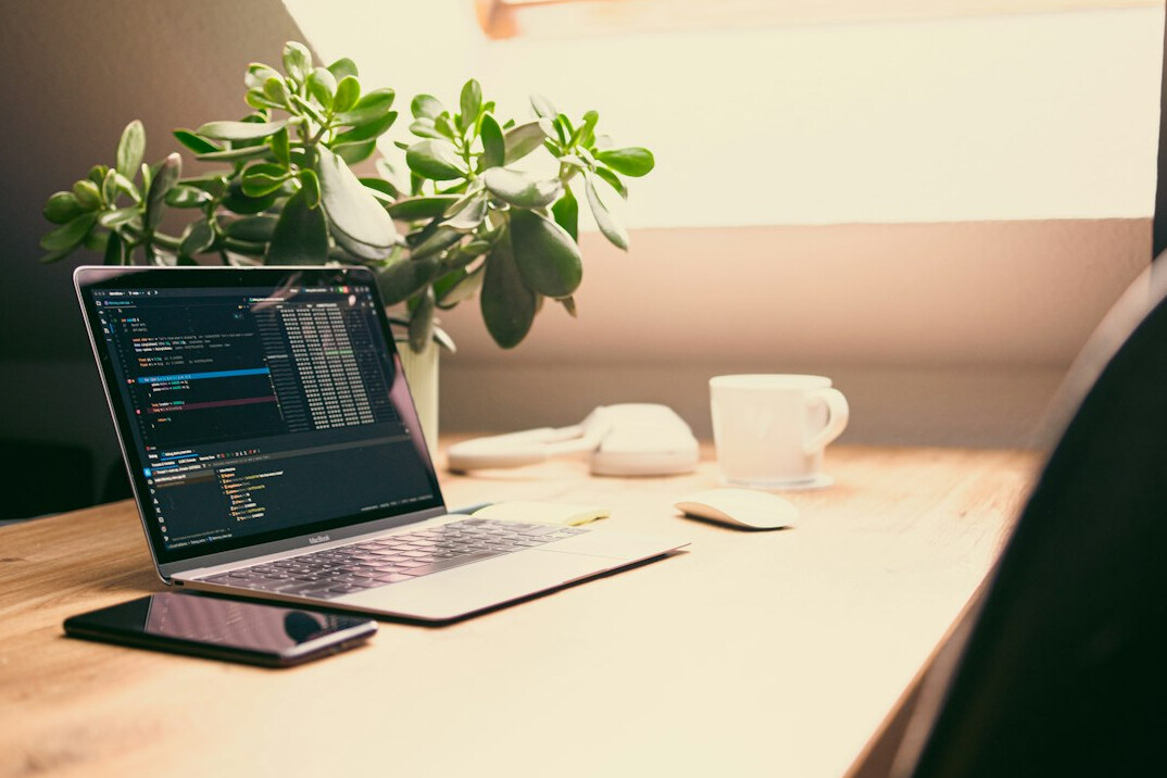 beginner coding on laptop